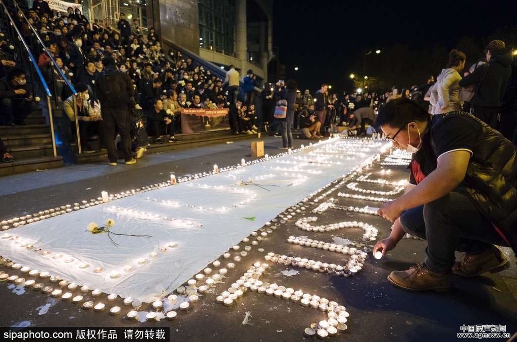 法国数千华人集会 悼念遭法警察枪杀中国公民